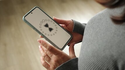 Girl With Smartphone Loading Process Waiting Then Holding It - Powered by Adobe