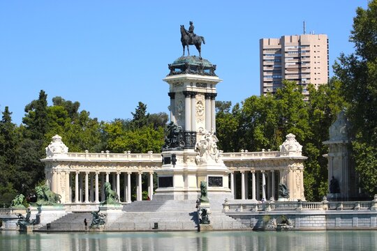 Monument and pond in El Retiro park Madrid Spain under daylight