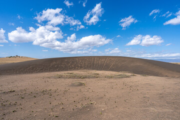 The shifting sands near Olduvai Gorge in Tanzania, a unique natural dune that slowly moves across...