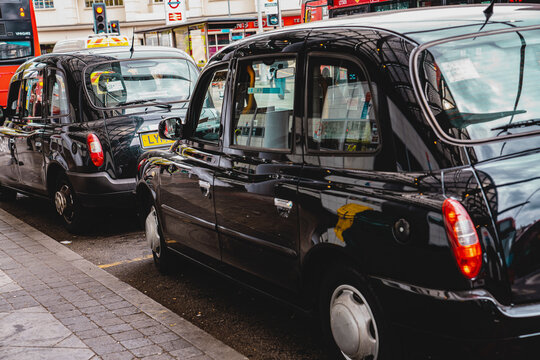 British Black Cab Taxi, Traditional Hackney Carriage Minicab, LTI TXII Brand, Finsbury Park Station, London, England, United Kingdom &ndash; August 2025