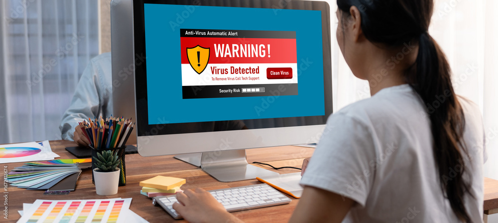 Poster virus warning alert on computer screen detected brisk cyber threat , hacker, computer virus and malw