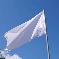 White flag waving in bright blue sky