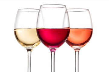Wine glasses with red white and rose wine isolated on a white background With a clipping path Focus stacking
