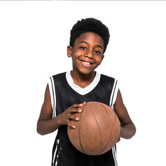 Photograph of a happy African American boy in a basketball uniform holding a ball isolated on a white background studio shot