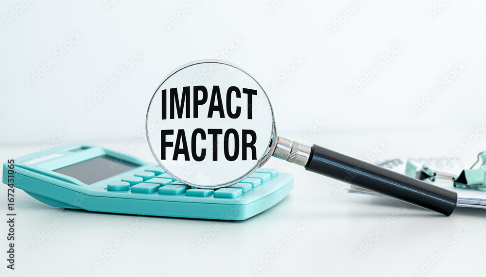 Aufkleber A calculator sits on a table with a magnifying glass and the word Impact Factor written on it
