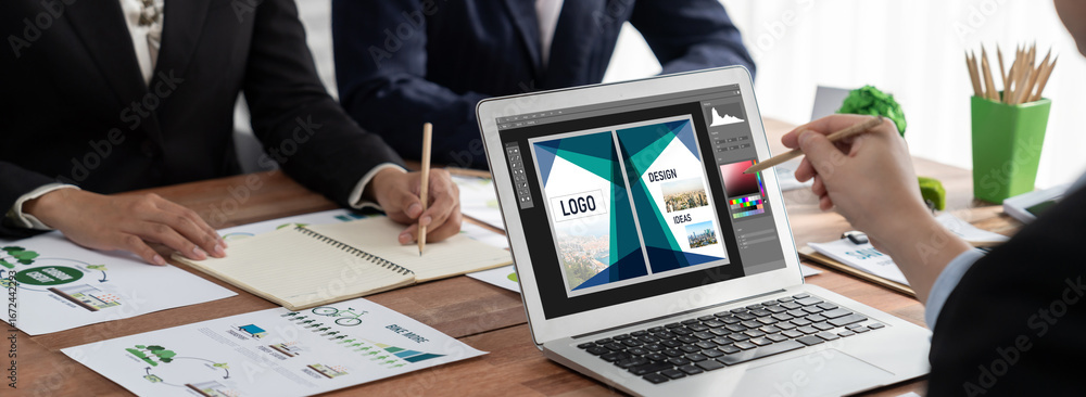Aufkleber graphic designer software for modern design of web page and commercial brisk ads showing on the comp