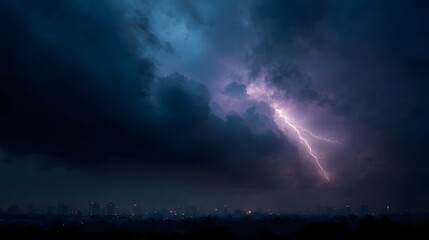 Thunderstorm over the city skyline at night