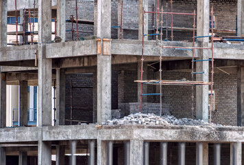 construction site monolithic reinforced concrete, outdoors view of the interior of concrete pillars of the interior of a building multistory
