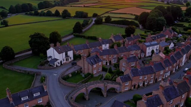 Drone-Captured ry of Rural Countryside at Dusk During the Summer Season