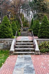 Obraz premium Stone Garden Stairway with Symmetrical Trees 