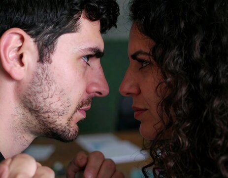 Angry couple facing off