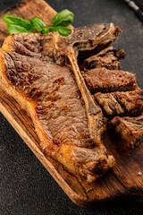 t-bone steak roast cut of meat juicy roast beef tasty snack fresh delicious gourmet food background on the table rustic food top view copy space