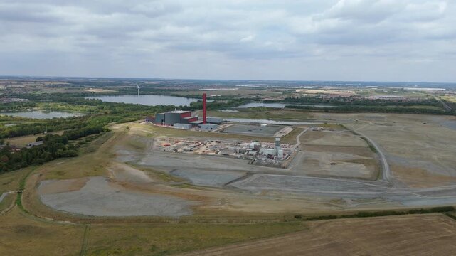Aerial drone view of Millbrook and Rookery industrial power plant, energy generation from gas and oil, smoke stacks, Bedford England UK
