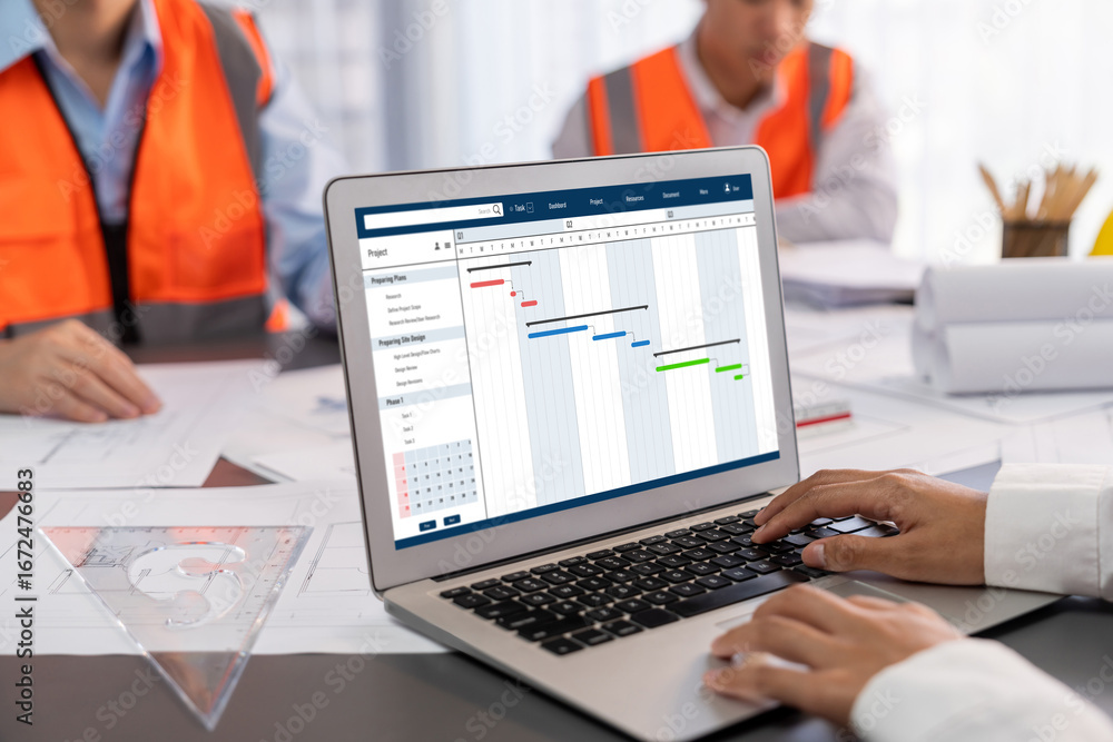 Aufkleber project planning software for brisk business project management on the computer screen showing timel