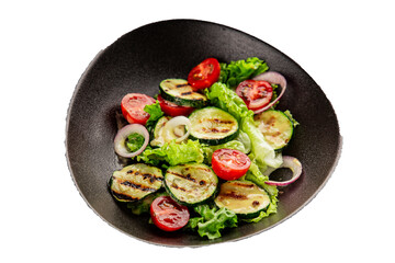 Salad grilled zucchini, tomato, lettuce tasty snack fresh delicious gourmet food background on the table rustic food top view copy space keto and paleo diet vegan and vegetarian food