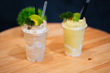 Fresh fruit juice blended Yogurt fresh fruit smoothie avocado , taro with milk.