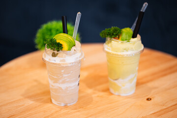 Fresh fruit juice blended Yogurt fresh fruit smoothie avocado , taro with milk.