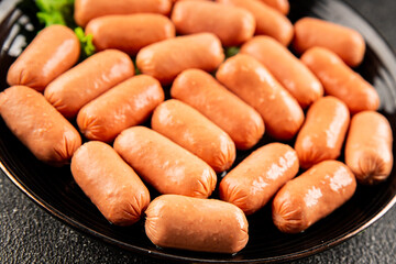 Mini sausages fresh delicious processed meat tasty snack fresh delicious gourmet food background on...