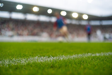 white line on the field soccer match in the background