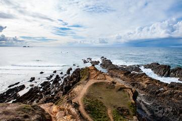 Rocky headland stretching into the ocean in the Byron Bay area, New South Wales, Australia