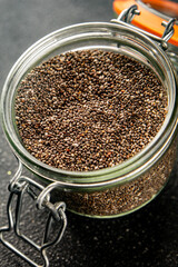 Chia seeds healthy superfood tasty snack fresh delicious gourmet food background on the table rustic food top view copy space keto and paleo diet vegan and vegetarian food