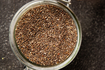 Chia seeds healthy superfood tasty snack fresh delicious gourmet food background on the table rustic food top view copy space keto and paleo diet vegan and vegetarian food