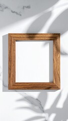 Wooden Square Frame on White Marble Background with Leaf Shadows
