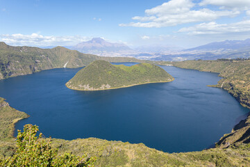 Aerial view of Cuicocha Lagoon, a stunning crater lake at the foot of Cotacachi Volcano in Ecuador....