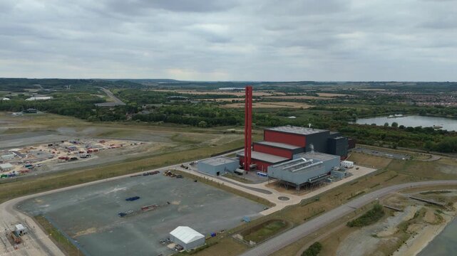Aerial drone view of Millbrook and Rookery industrial power plant, energy generation from gas and oil, smoke stacks, Bedford England UK