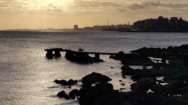 Wide shot montevideo coastal and skyline at background high contrast sunset landscape video