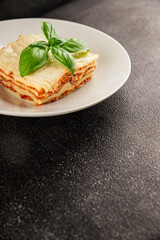 Lasagna bolognese béchamel sauce, meat, cheese second course tasty snack fresh delicious gourmet...