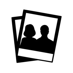 Black and white silhouette of a couple in photographs stacked diagonally
