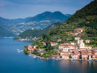 Obraz premium Peschiera Maraglio in Monte Isola, Lake Iseo or Lago d'Iseo. Beautiful island in Lombardy, Italy. Aerial drone view