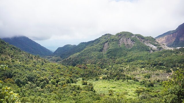 Natural rocky slope of Papandayan Mountain, showcasing volcanic landscape in West Java.