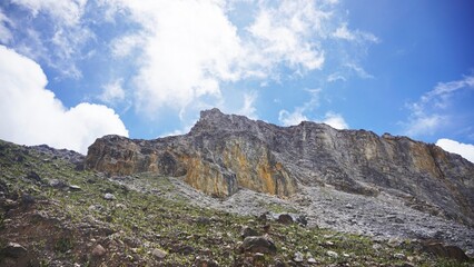 Natural rocky slope of Papandayan Mountain, showcasing volcanic landscape in West Java.