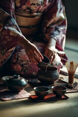 Traditional Japanese or Chinese Asian Eastern tea ceremony, woman in kimono gracefully preparing tea in cups using elegant utensils in a tatami room.