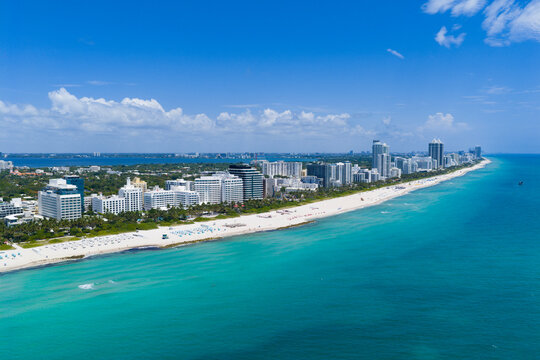 Aerial view of Miami beach coastline. Skyline and skyscrapers at Miami Beach. Summer Miamis vibes. Panoramic cityscape of Miami Beach. Miami skyline at daylight.