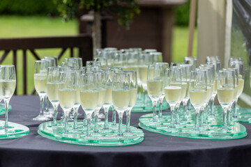 Champagne Glasses Arranged on a Table at an Outdoor Celebration