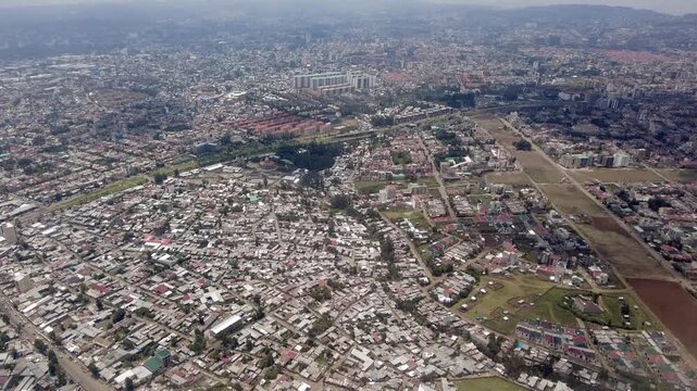 Aerial flyover of the sprawling slums and city of Addis Ababa, Ethiopia.