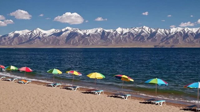 Peaceful ry of large inland body of water accompanied by shaded beach furniture, suitable for holiday-themed designs