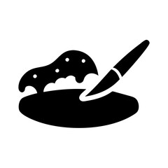 Black silhouette of a pen writing on a blob of ink icon