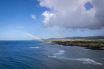 Coastal Rainbow Over Ocean