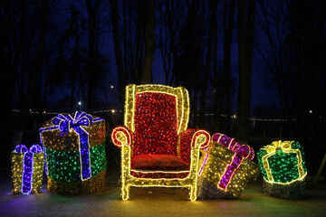 Giant luminous Christmas glowing figure of presents