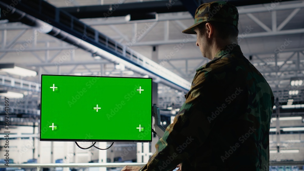 Poster military data center professional using software on green screen mockup pc to detect enemy threats. 