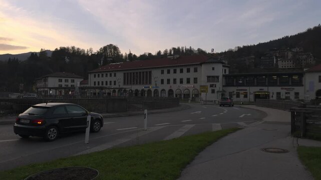Germany, Berchtesgaden. View of station building from forecourt Berchtesgaden Hauptbahnhof railway station at sunset. Bahnhofplatz. Hbf. Railroad transportation in Deutschland. 