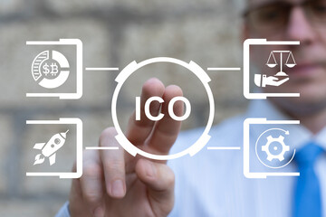 ICO Initial Coin Offering Finance Concept. Financial investment, cryptocurrency, blockchain, coin and digital asset. Business person using virtual touch screen presses the acronym ICO.