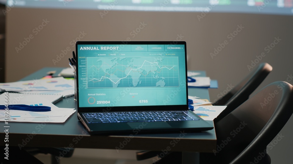Poster modern corporate space sits empty after hours with forecasting charts and business analytics display