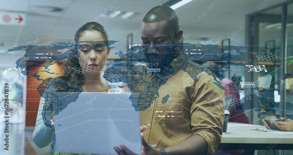 Poster business colleagues tapping and pointing tablet creating animated world map overlay with data icons