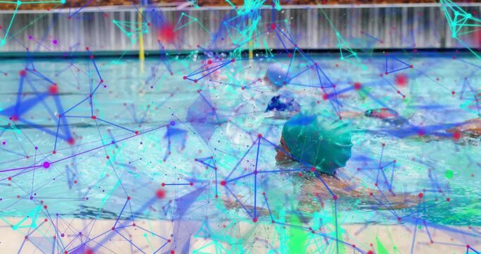 Green-capped child spotting floating ball and kicking legs chasing ball with peers in swim lesson