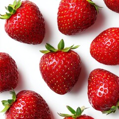 A close-up shot of fresh, ripe strawberries arranged on a surface. The vibrant red color of the berries pops against the background, highlighting their texture and appeal